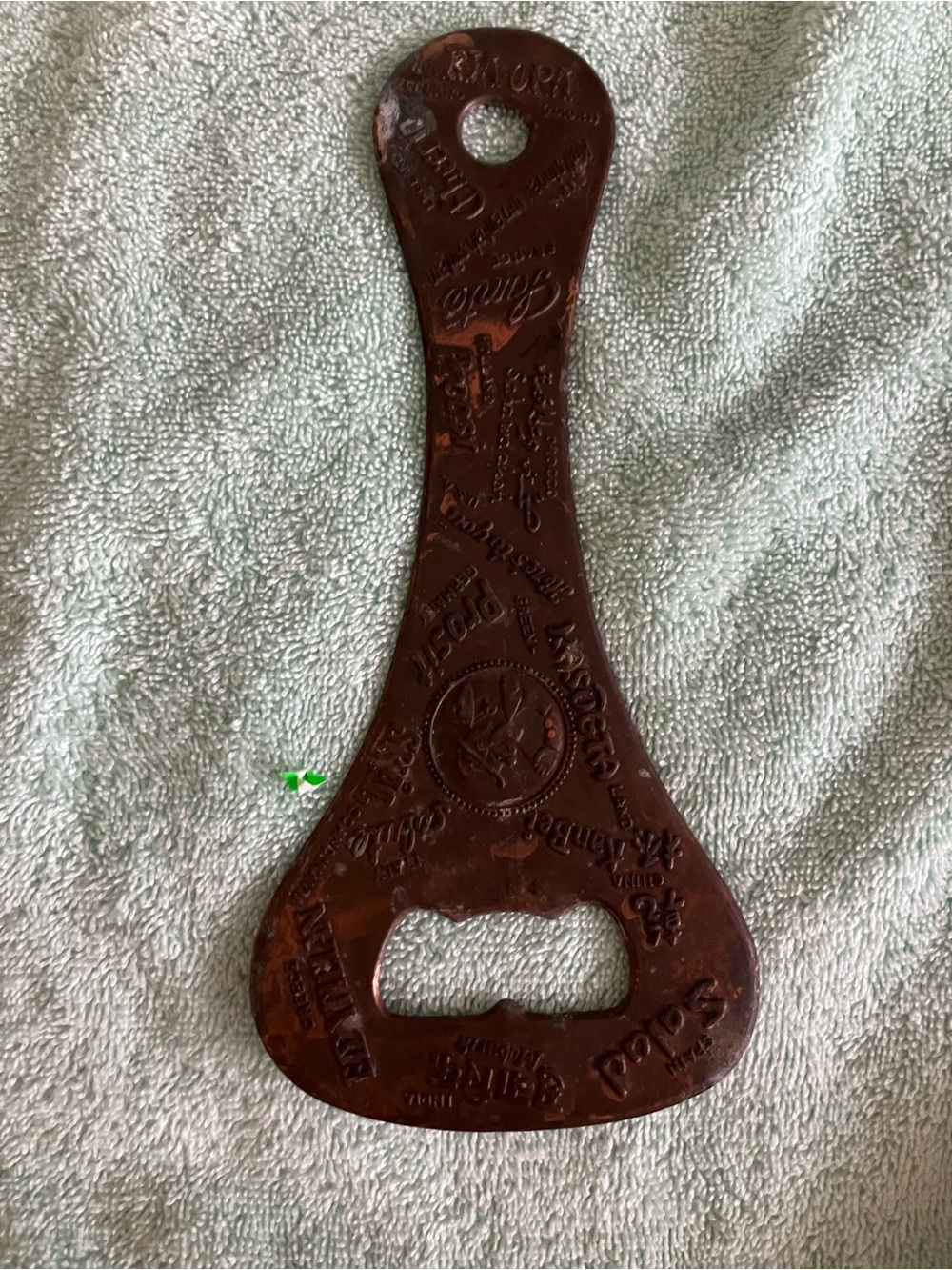 Vintage Metal Beer Bottle Opener Embossed International Greetings Logos